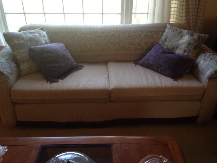 Sofa with pillows. Matching love seat.