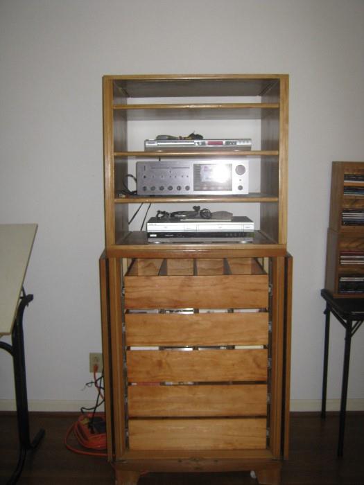 re-purposed storage cabinet with storage cube to hold components--shown here, top to bottom:  Koss progressive scan DVD & CD player, Carver receiver, and Sony DVD / CD player