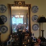 English gold leaf and black beveled mirror, pair of Staffordshire like porcelin dogs. Pier mirror 2 Matching buffet lamps