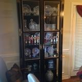 Lovely Henredon Black lacquer display cabinet and Waterford crystal and English figurines