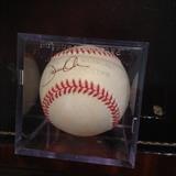Authentic signed Nolan Ryan Baseball in case