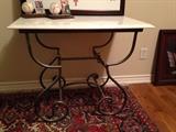 Very nice heavy marble top table with metal base, you need 2 people to move this!