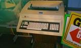 Boat Anchor, was a computer or Typewriter, Possibly an IBM Selectric type machine with matching Stand or Cart, asking $10.00.