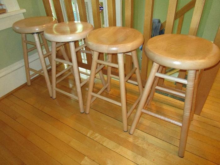 Set of four swivel bar stools