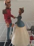       Vintage Cinderella & her prince wind-up toy