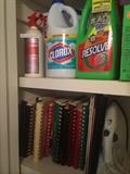         Many cleaning products; cookbooks; iron