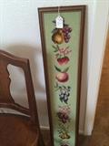          Antique chair; needlepoint fruit in frame 
