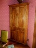 American curly maple corner cabinet.