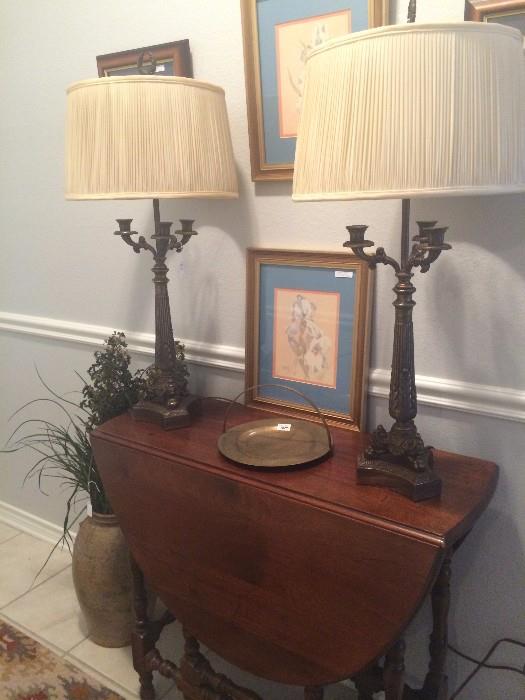               Drop leaf table; lamps; framed art