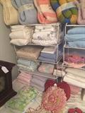              Many blankets, sheets, and towels
