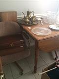 1 of 4 chairs on rollers; drop-leaf breakfast table