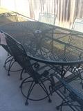            Oval patio table with 6 spring chairs 