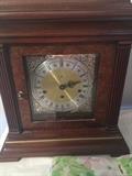  Howard Miller triple chime mantel clock with key and instructions