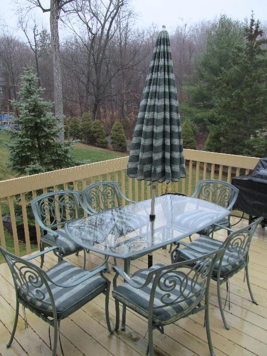 PATIO TABLE, 6 ARM CHAIRS, UMBRELLA AND SEAT CUSHIONS 