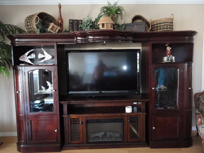 Three piece entertainment Center, 55 inch viso Tv & fireplace ( tv sets on the fireplace ) 