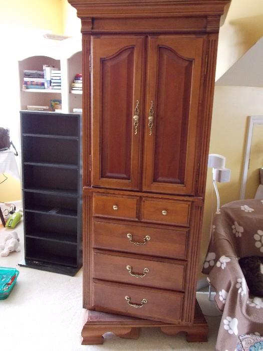 This is a 2 sided Chimney chest with mirror on the back  side all on a swivel base. See next few pictures