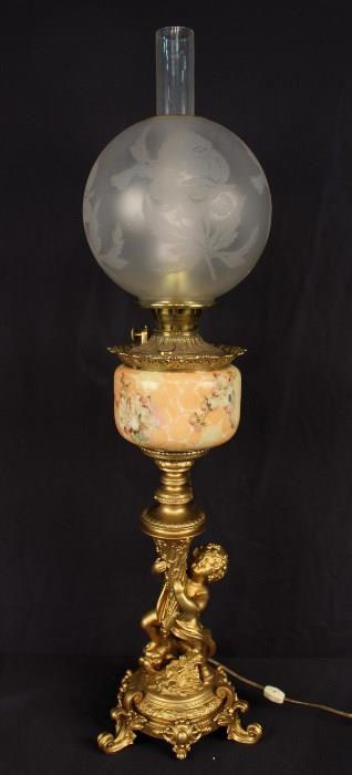 5 - Banquet lamp with figural, has been electrified in excellent condition, 40.5 in. T, bowl has damage