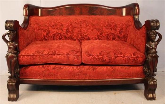 72 - Karpen sofa with full figures on arms, solid mahogany, 41in. T, 64 in. W, 23 in. D.
