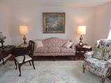 Living Room with Ethan Allen Sofa, Stiffel Lamps, End Tables and fine Monet framed print