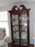 One of several fine glass and wood curio cabinets full of goodies !!!