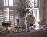 large silver punch bowl with wine cooler liner, silver chafing dishes, silver trophy