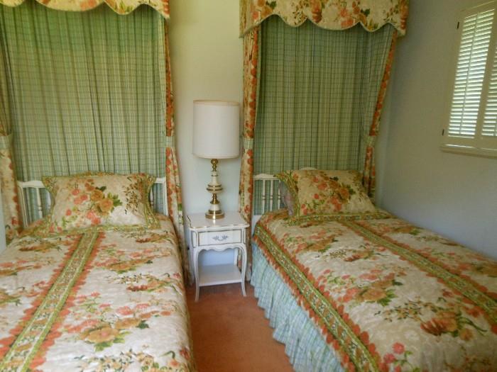 Matching twin beds, canopies & comforters