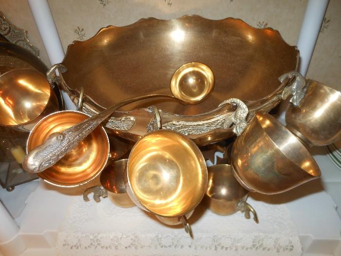 Ornate brass punch bowl set