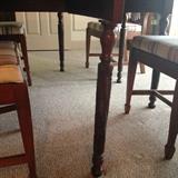 closeup of the hand carved legs on the Gateleg table