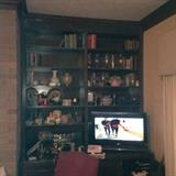 Flat Screen TV...Great stright back chair...Sterio System... VCR/DVD Players...Lots and Lots Deco What nots