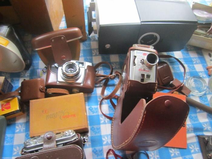 vintage cameras - Kodak Retina ,Agfa Optima ,Brownie movie camera , slide projector , Brownie movie screen