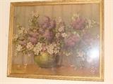 Vintage print of flowers in vase surrounded by a beautiful gold gild frame