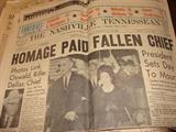 A number of Vintage newspapers with varying headlines covering the death, burial and possible senate investigation of the President Kennedy assasination.
