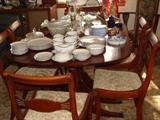 Beautiful 1930's Mahogany Dining Table with gorgeous Duncan Phyfe Triple Pedestal Base, 6 Matching Chairs and Leaves
