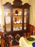 Lighted China Cabinet lovely fancily scrolled top with Gold gilded etching on side front glass and glass shelves with cupboard style doors and shelving below in cabinet