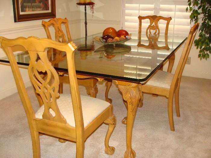 Beautiful Chippendale style glass top Dining Table and matching Chairs