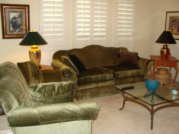 beautiful sofa and matching easy chair with glass topped coffee table, matching lamps, etc