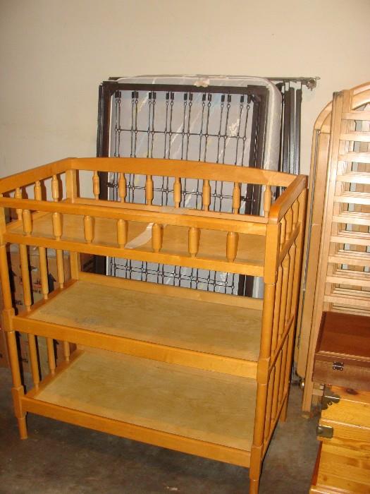  Beautiful Dual Cribs absolutely like new! Complete with matching mattresses and springs plus a beautiful matching Changing Table!