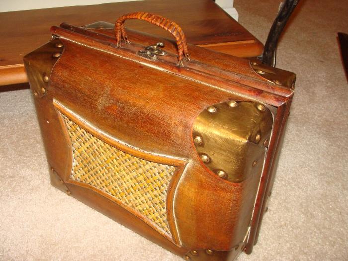 beautiful wooden and cane carrying case with brass trim