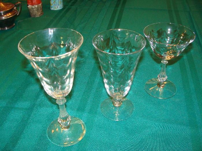 Gorgeous matching stemware many pieces of each style glass. This crystal stemware is over 100 yrs old