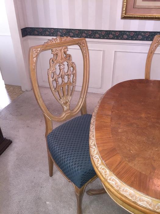 Carved Table and 6 Chairs