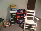 Lots of Toys.
White Rocking Chair