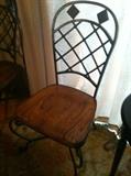 Chairs that go with table...heavy, wrought iron backs & legs