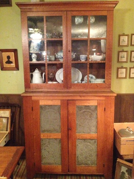 Cupboard with original glass and pierced tin