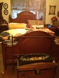 Walnut bed, trunk, quilts