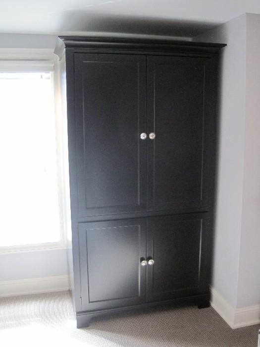 Ebony armoire.
