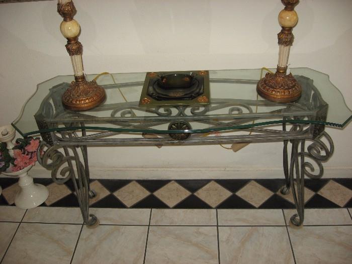 pretty iron and glass sofa table - there is also a matching coffee table
