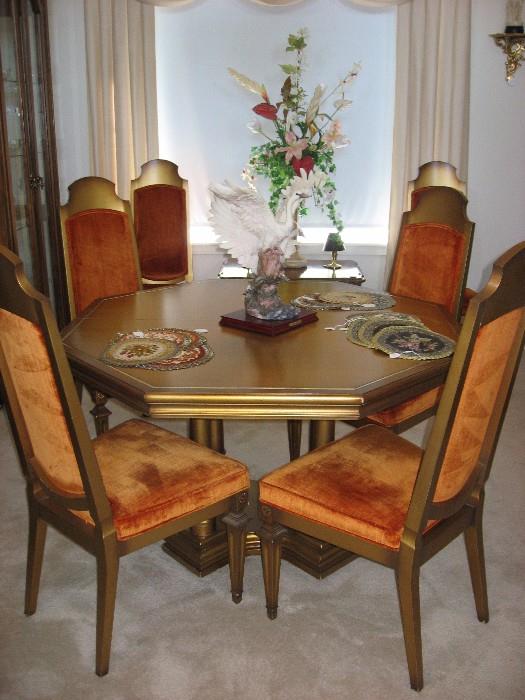 the dining room table includes six chairs, two leaves and felt pads