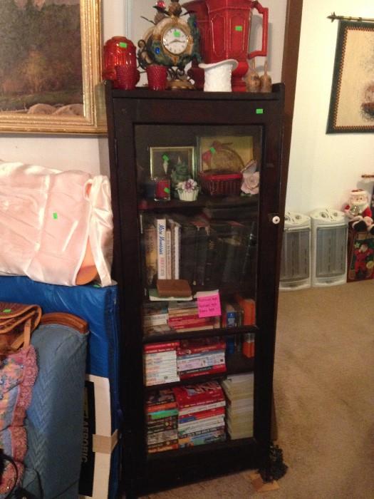antique cabinet, books, bibles