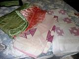quilts , satin comforters 