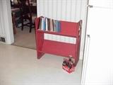 Two level painted bookcase and vintage cookbooks, old coke carton and bottles